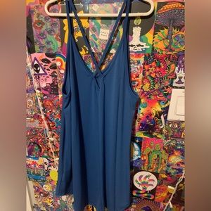 it is a large shirt but could be worn as a cute dress
